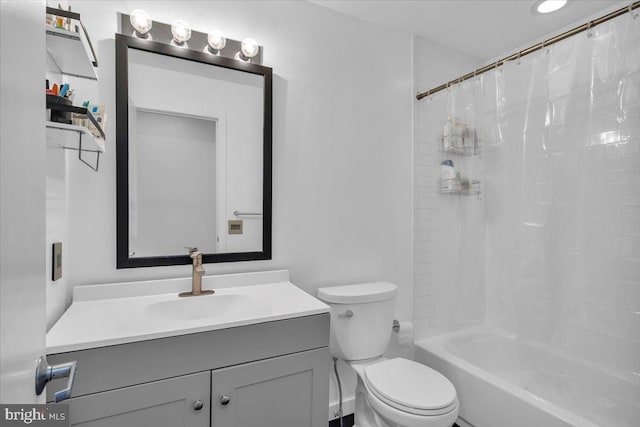 full bathroom featuring shower / bath combination with curtain, vanity, and toilet