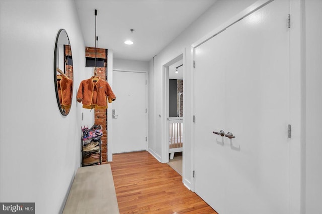 hall featuring light hardwood / wood-style floors