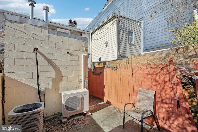 view of patio / terrace featuring ac unit and central air condition unit