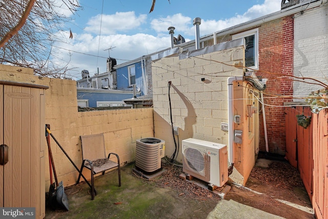 view of yard featuring central AC and ac unit