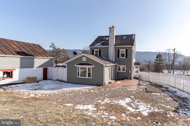 view of snow covered property