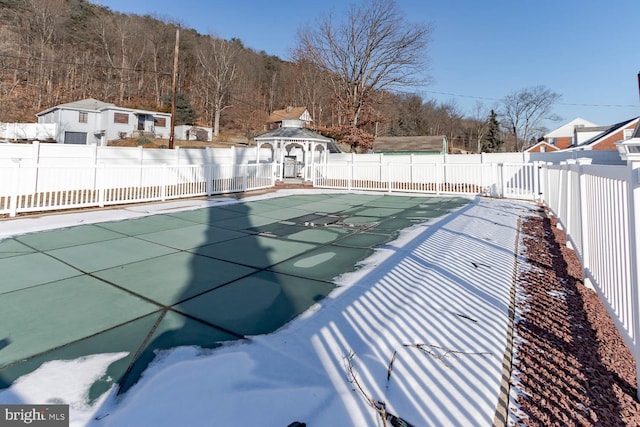 view of swimming pool with a gazebo