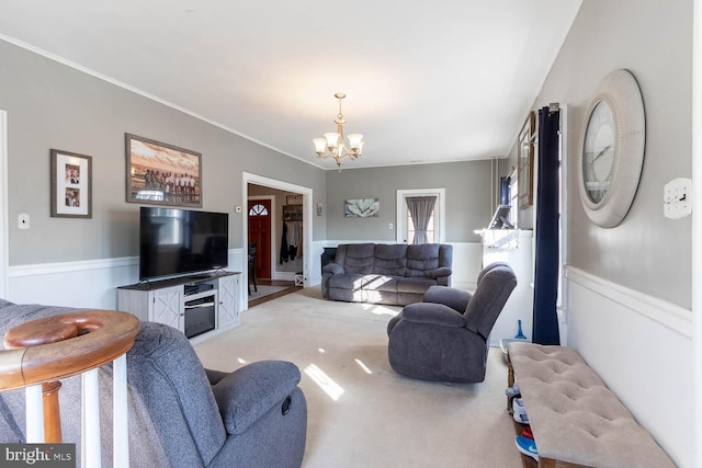 living room featuring light carpet and an inviting chandelier