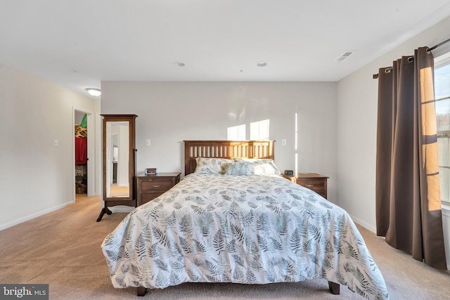 bedroom with light carpet