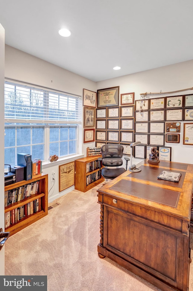 home office featuring light carpet