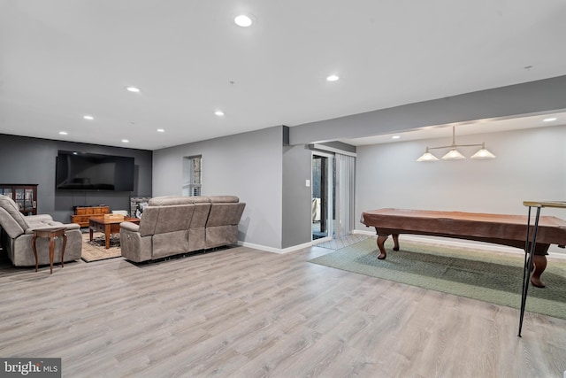 game room featuring light wood-type flooring