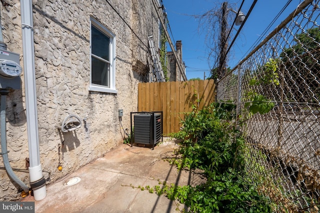 view of property exterior featuring central AC unit