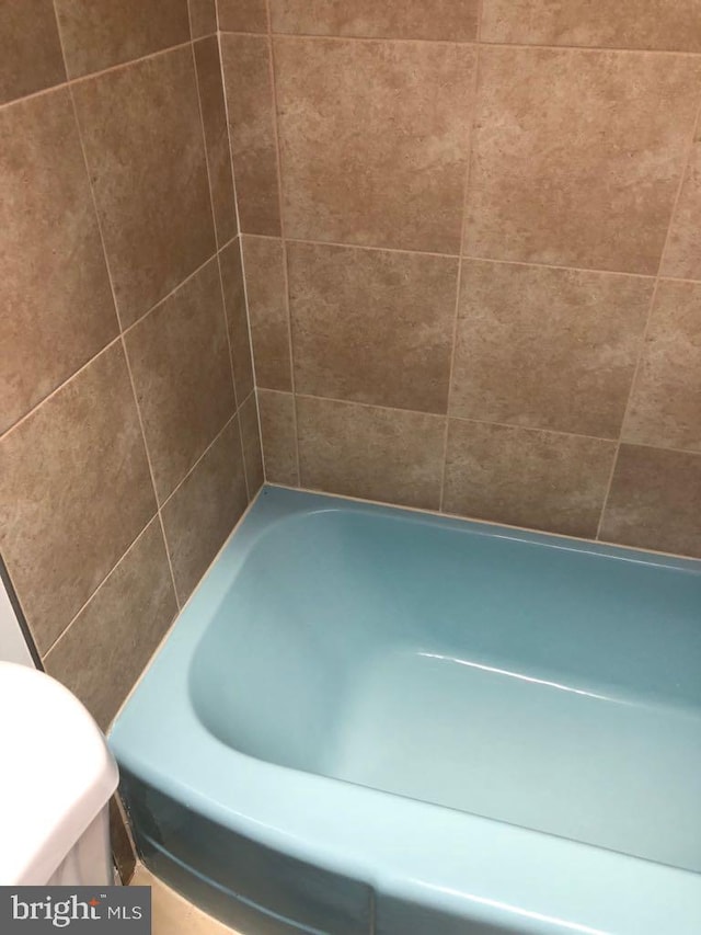 bathroom with a bath