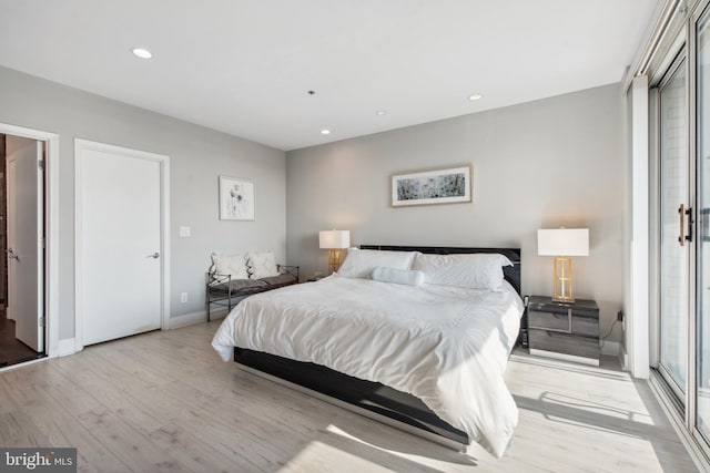 bedroom featuring light hardwood / wood-style floors