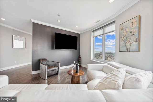 living room with ornamental molding and dark hardwood / wood-style floors