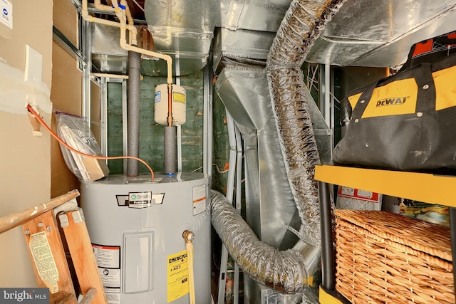 utility room with water heater