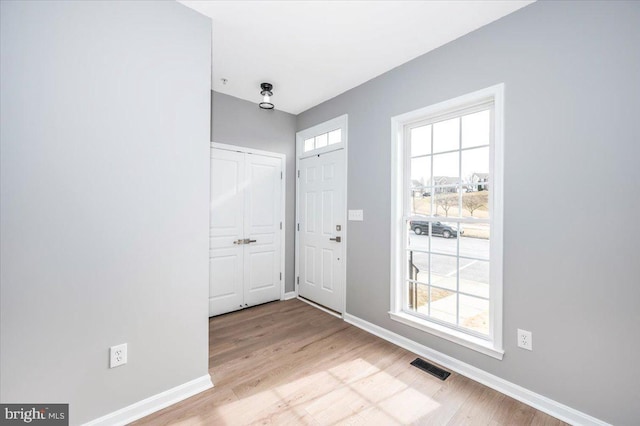 entrance foyer with light wood-type flooring