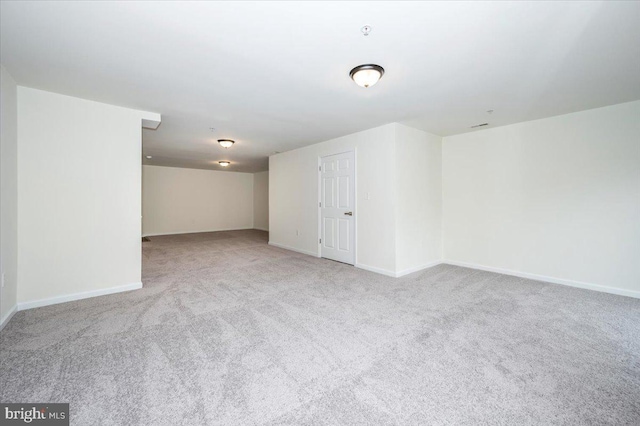 basement with light colored carpet