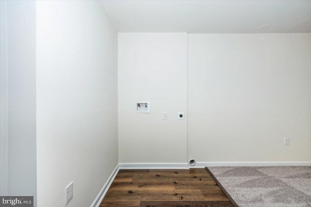 clothes washing area with hookup for a washing machine, electric dryer hookup, and dark hardwood / wood-style floors