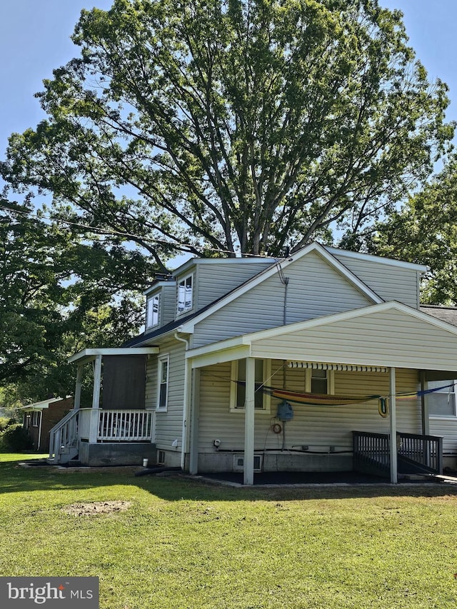 exterior space with a yard and covered porch