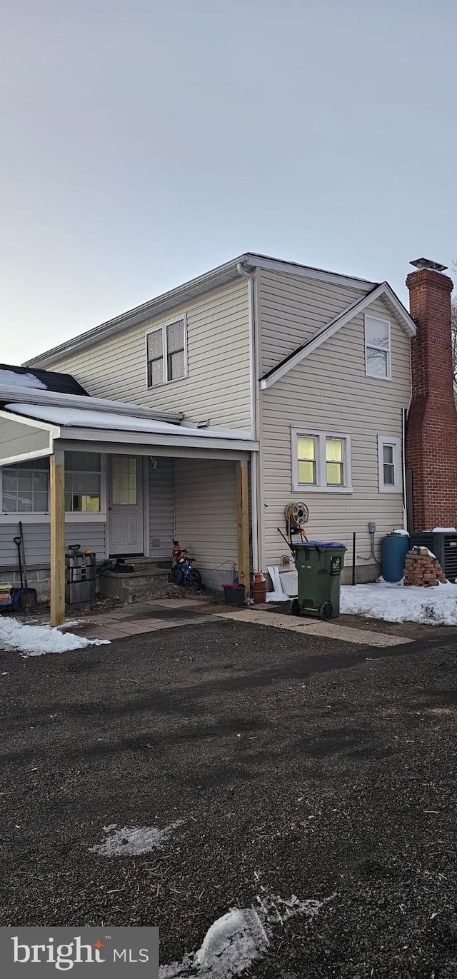 view of front of property with cooling unit