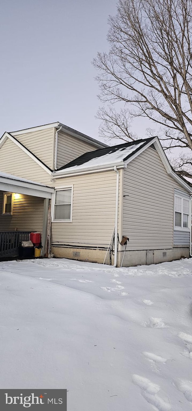 view of snow covered property