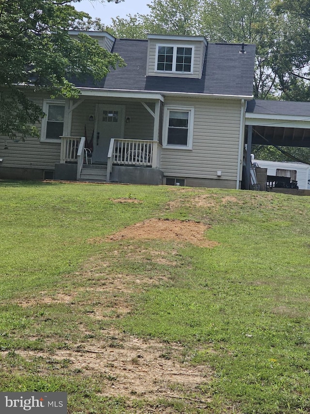 view of front of house featuring a porch and a front lawn