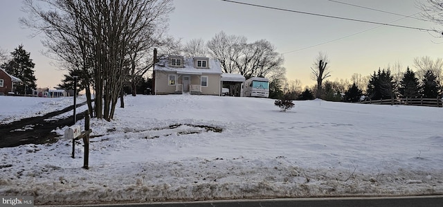 view of yard layered in snow