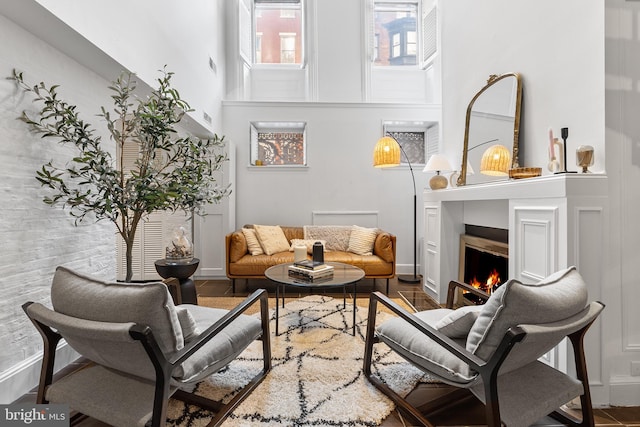 living area with a high ceiling