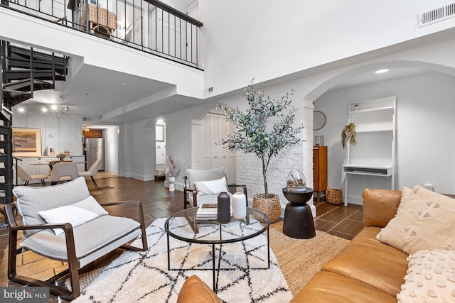 living room with a high ceiling