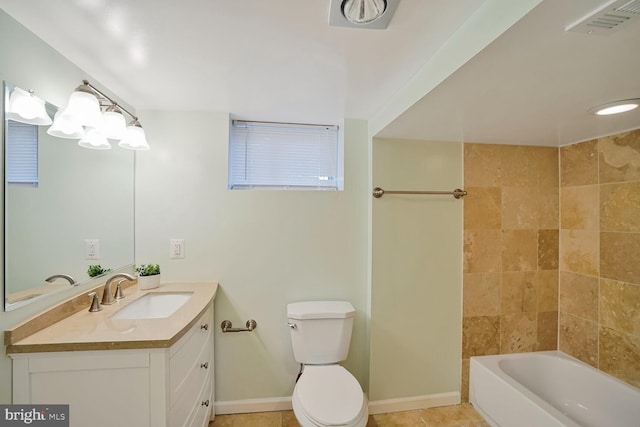 bathroom featuring vanity, baseboards, visible vents, tile patterned floors, and toilet