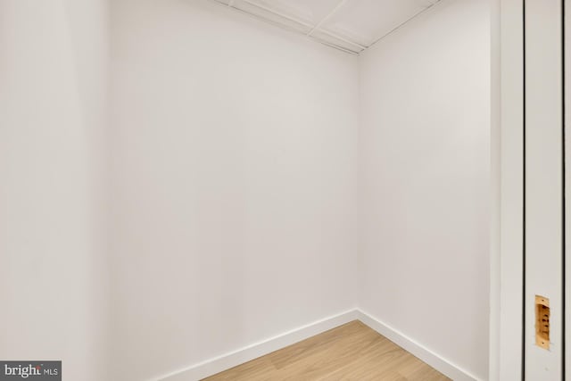 spacious closet featuring hardwood / wood-style floors