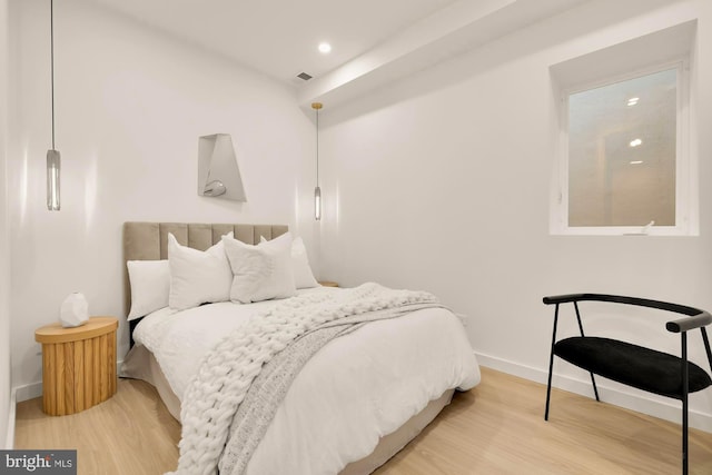 bedroom featuring hardwood / wood-style flooring