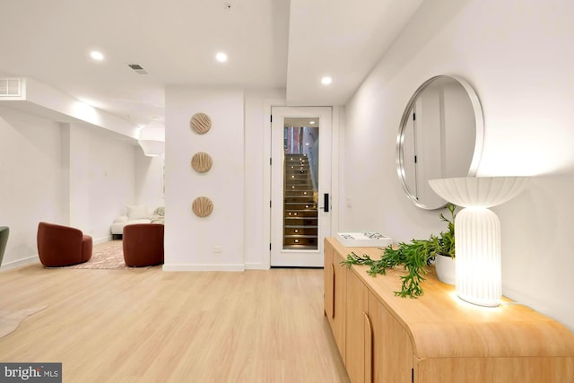 hall featuring light hardwood / wood-style flooring