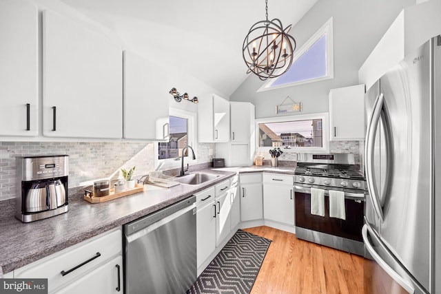 kitchen with white cabinetry and appliances with stainless steel finishes