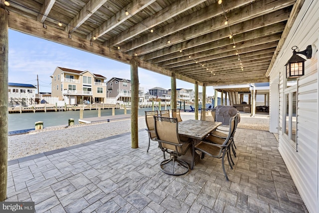 view of patio / terrace featuring a water view