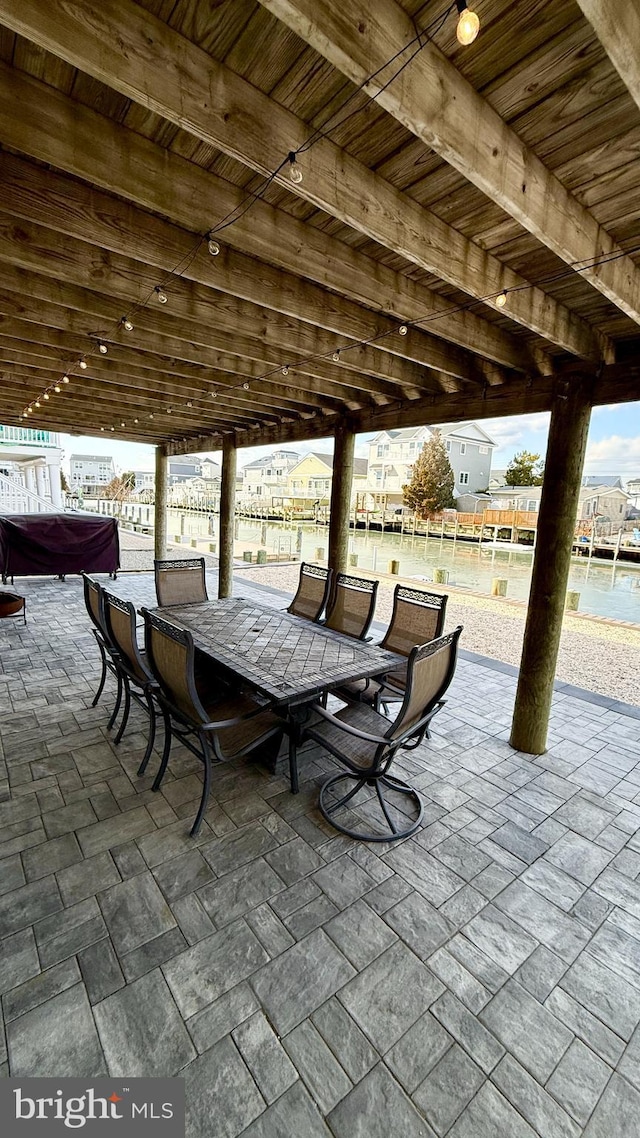 view of patio / terrace with a water view