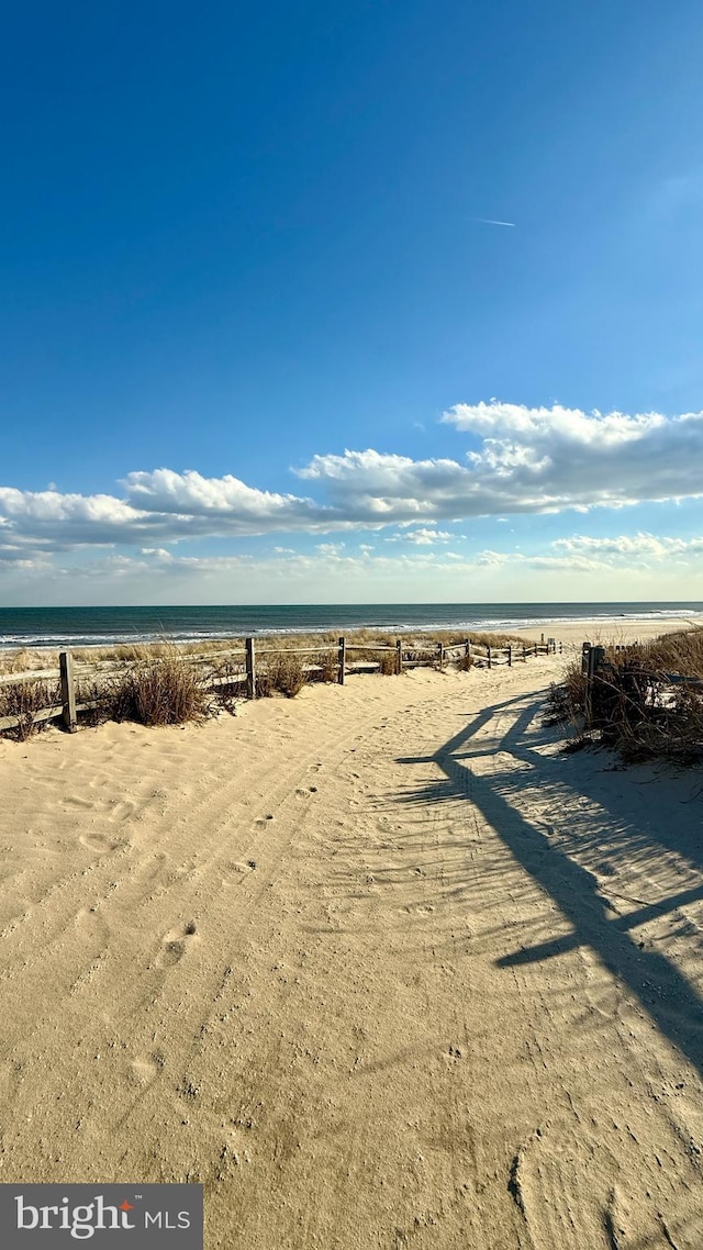 property view of water featuring a view of the beach