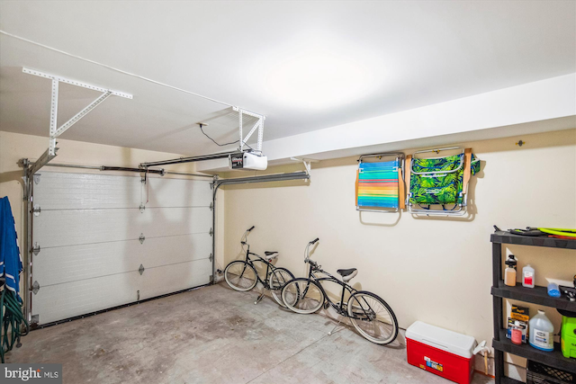 garage featuring a garage door opener