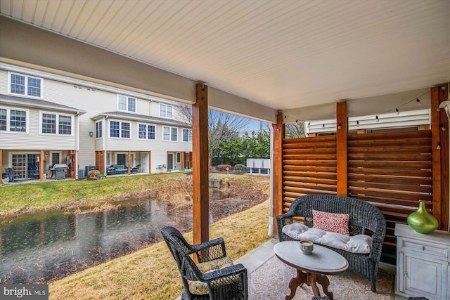 view of patio featuring a grill