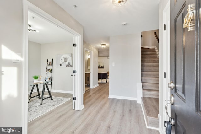 entrance foyer with light hardwood / wood-style floors