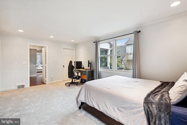 carpeted bedroom featuring ornamental molding