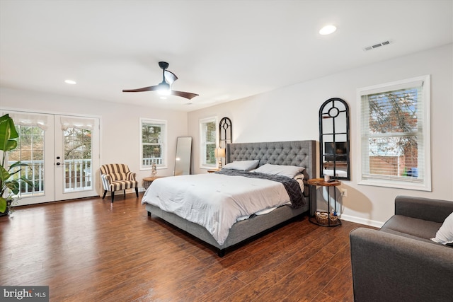 bedroom with french doors, access to exterior, dark wood-type flooring, and multiple windows