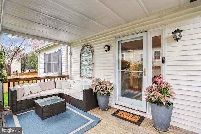 deck featuring outdoor lounge area