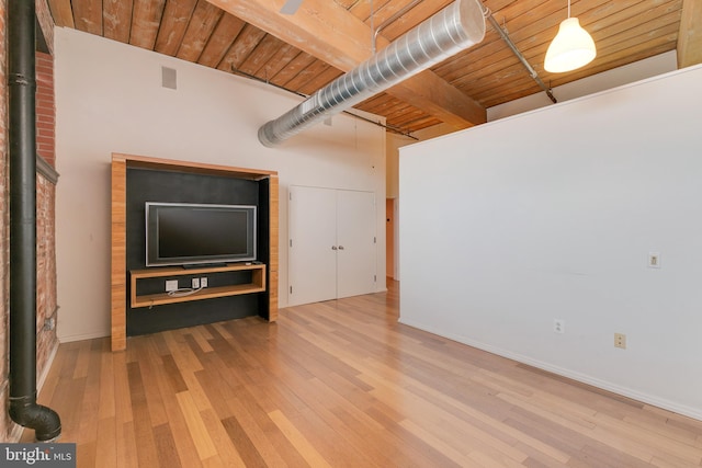 unfurnished living room with wood-type flooring