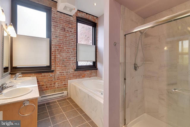 bathroom featuring tile patterned flooring, a baseboard heating unit, plus walk in shower, and a healthy amount of sunlight