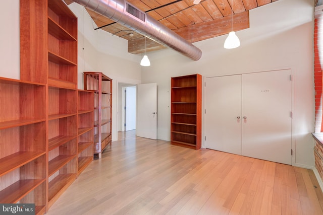 interior space with wood ceiling and light wood-type flooring