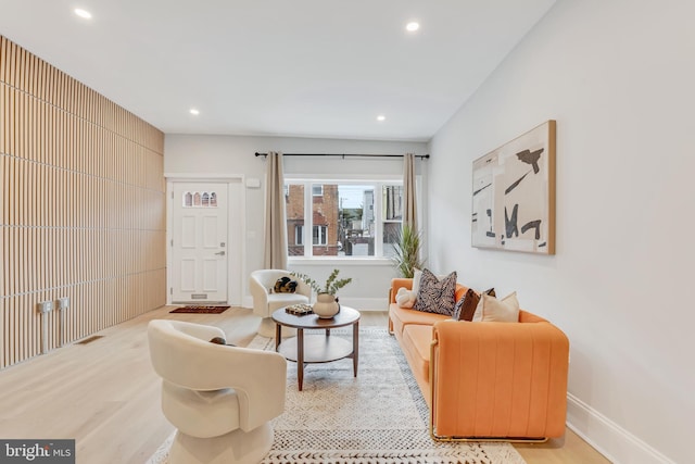 living room with light hardwood / wood-style flooring