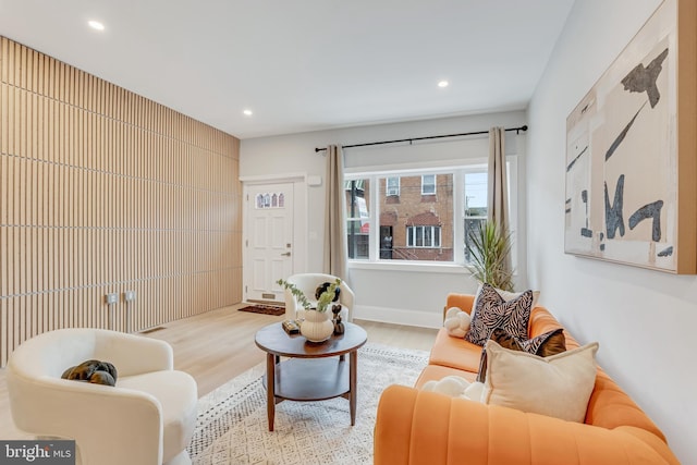 living room with light hardwood / wood-style flooring