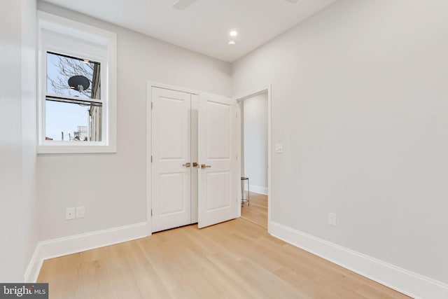 unfurnished room featuring light wood-type flooring