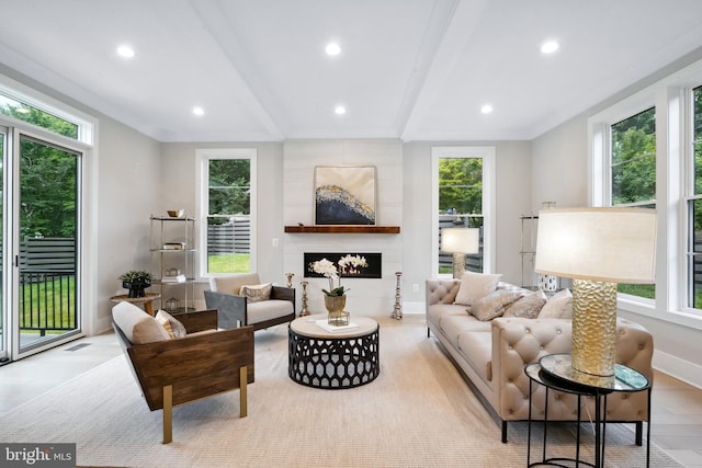 living room with beamed ceiling and light hardwood / wood-style flooring