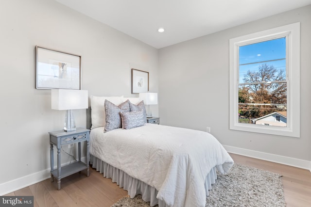 bedroom featuring wood-type flooring