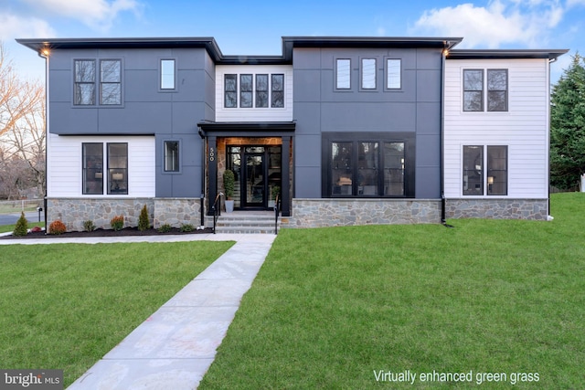 view of front of home with a front yard