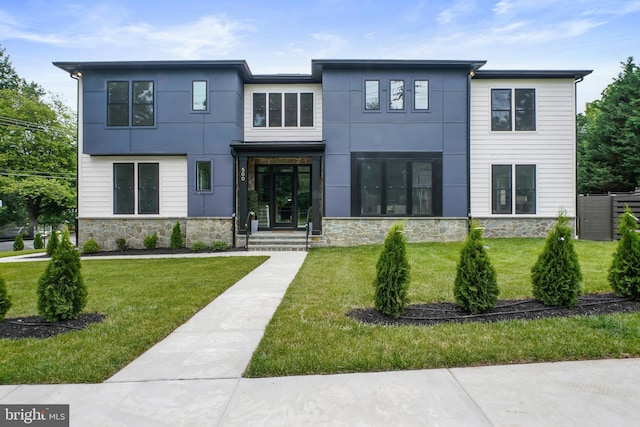 view of front of home with a front yard