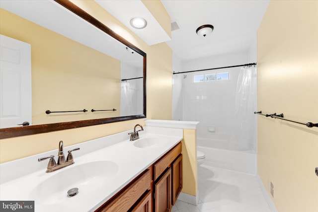 full bathroom featuring vanity, shower / tub combo with curtain, tile patterned floors, and toilet